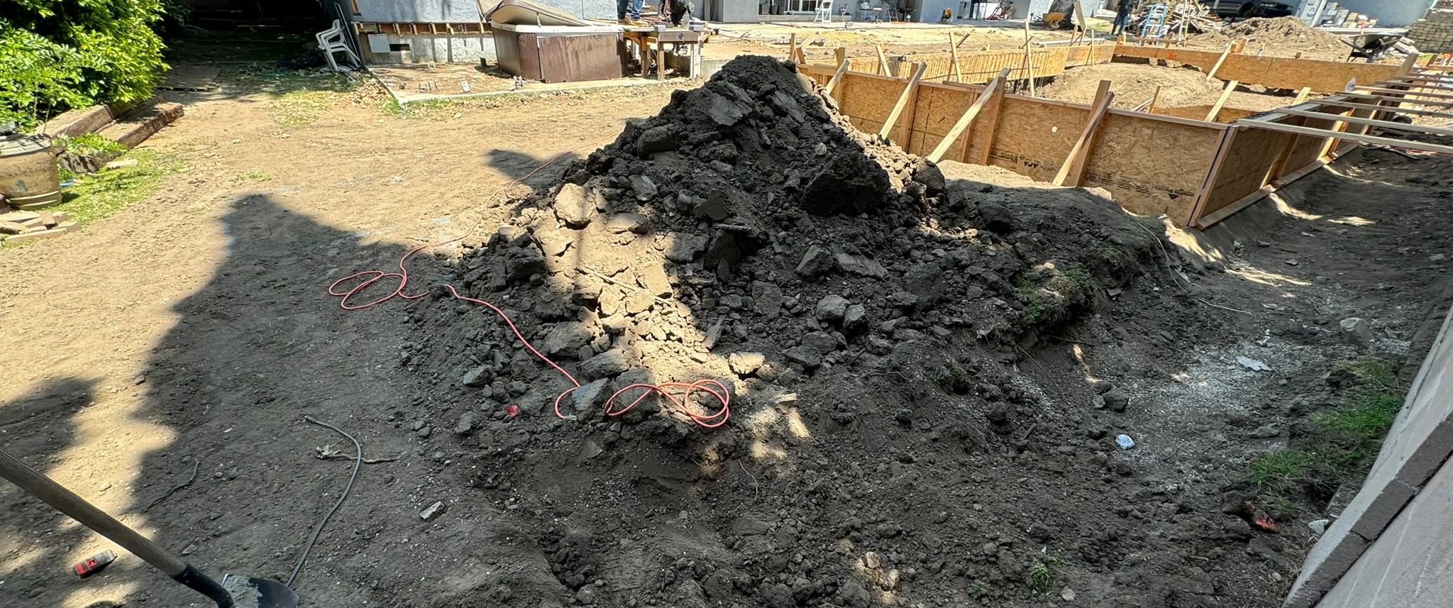 Arnwood — trenching alongside the house during excavation, under construction