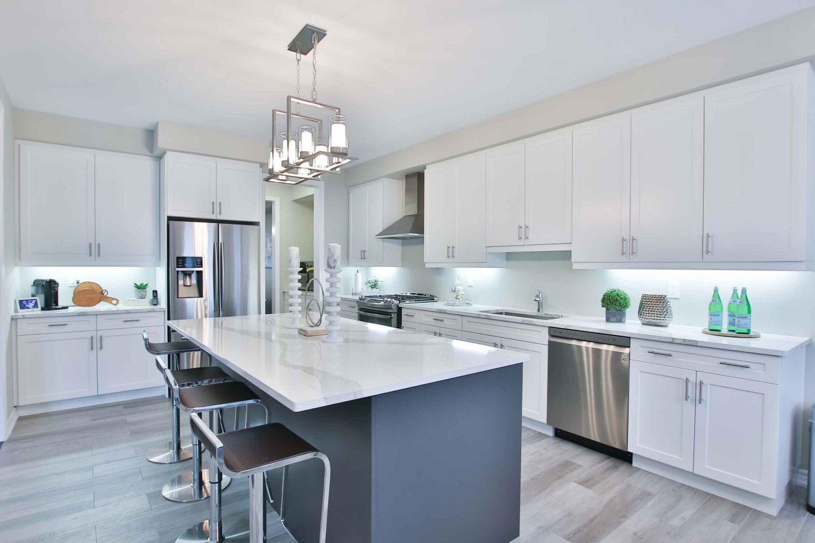 Modern luxury kitchen renovation with custom cabinetry and island