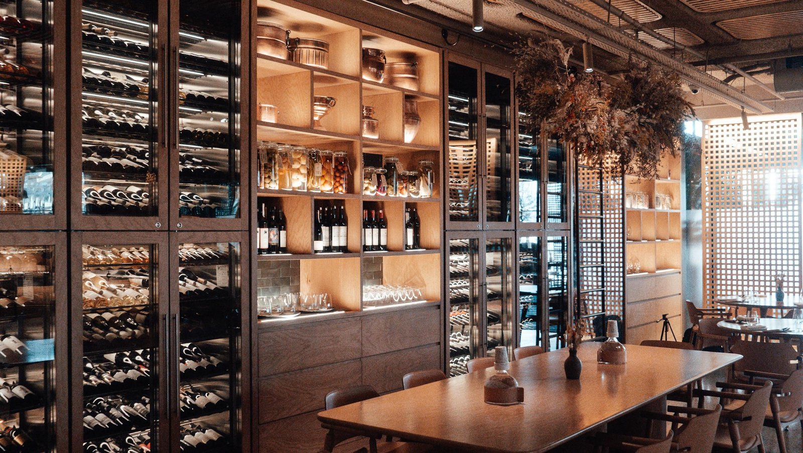 Custom home wine cellar with wood racking and bottles